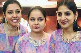 Models exhibit the new "Auro Gold" collection at Trendsmith, Chandigarh