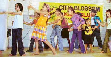 City Blossom Kids Club students present a cultural programme on the conclusion of a summer camp