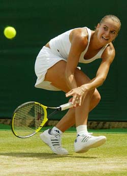 Croatia's Karolina Sprem returns a shot from Bulgaria's Magdalena Maleeva 