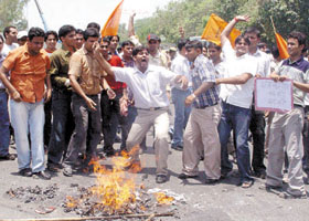 Activists of ABVP protesting against the move to hike the price of DTC bus pass for the students on the north campus in the Capital on Tuesday. 