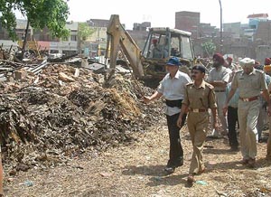 Debris of structures demolished by the municipal corporation at the Sabzi Mandi in Amritsar