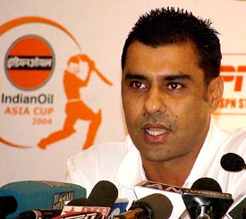 Former Pakistani cricket captain Waqar Younis addresses a Press conference in New Delhi 