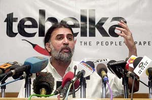 Tehelka chief Tarun Tejpal addresses a Press conference in which he claimed to have exposed a false-insanity certificate racket in Agra