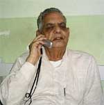 Senior Congress leader Nawal Kishore Sharma who has been appointed as Governor of Gujarat, talks on phone in Jaipur