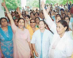 Doctors and paramedical staff of Government Rajindra Hospital protest on the hospital premises