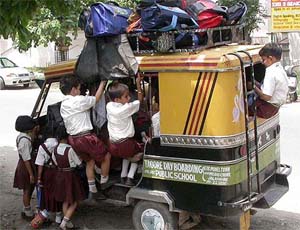 Overloading of vehicles carrying schoolchildren is a common sight in the Doaba region
