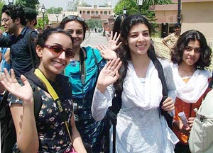 Students of the National College of Arts, Lahore, arrive on a 15-day visit to India at Wagah on Tuesday.