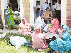 Patients outside the OPD of Government Rajindra Hospital in Patiala on Thursday.