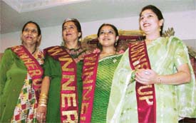 Winners of the Sawan Queen contest organised at Niharika Ladies Club