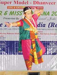 A child performs at a cultural evening organised by the Anari Friends Club International at Nehru Siddhant Kendra