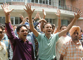 B.Ed aspirants protest against a quota notification outside the counselling hall at Guru Nanak Dev University in Amritsar on Wednesday.