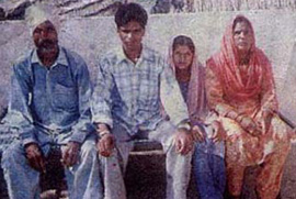 Milkha Singh (centre) with his family.
