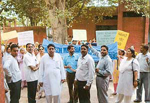 Members of the Christian community protest in Kharar