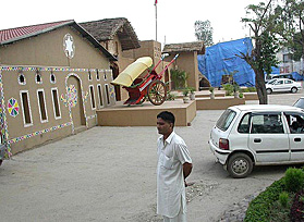 The huge concrete parking lot of two prominent dhabas at Khajurla village on the outskirts of Jalandhar city which has allegedly been set up on the land belonging to the Punjab Forest Department.
