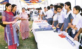 Students display their models at a science exhibition organised at Saraswati Model High School