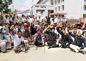 Unemployed teachers hold a protest rally in Moga on Wednesday.