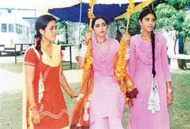 Girls dressed up in traditional attire on the occasion of Teej, organised at Guru Nanak National College, Doraha