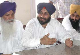 Mr Sukhbir Singh Badal, general secretary, SAD, addresses a press conference in Jalandhar