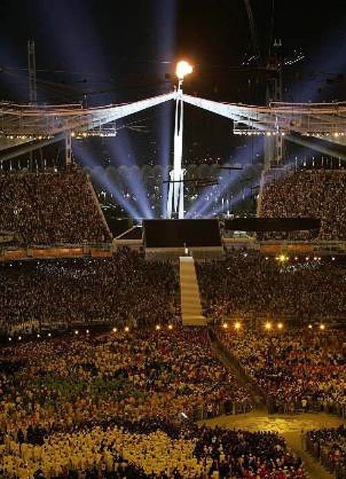 The the Olympic flame burns during the opening ceremony