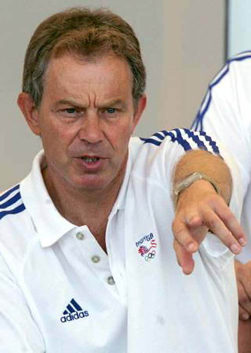 Leaders of Washington's top allies in Iraq, Britain and Poland, have backed an appeal for an Olympic Truce just as intense fighting involving the allied forces is set to resume in the holy city of Najaf. Prime Minister Tony Blair watches racing at the Shinias Olympic Rowing and Canoeing Centre at the Athens 2004 Olympic Games.REUTERS/Toby Melville
