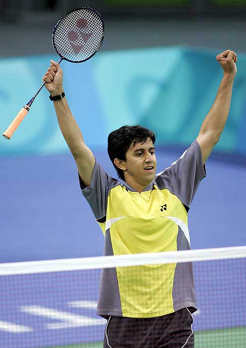 India's Nikhil Kanetkar jubilates after beating Spain's Sergio Llopis in the first round of the men's singles of the Olympic Games badminton competition, at the Goudi Olympic Hall in Athens 16 August 2004. Kanetkar beat Llopis 15-7, 13-15, 15-13. AFP PHOTO/GOH CHAI HIN