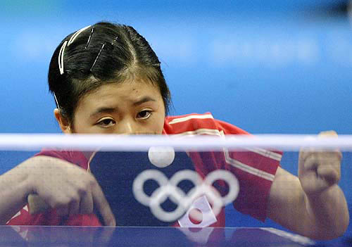 Japan's Ai Fukuhara plays a shot against Australia's Miao Miao