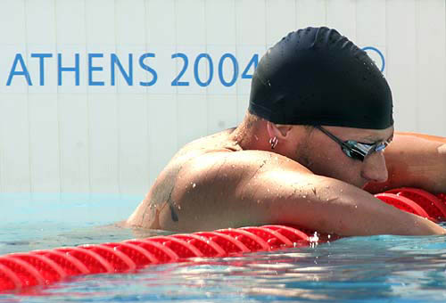 Canada's Morgan Knabe following his 200 meter breaststroke heat at the Athens 2004 Olympic Games, August 17, 2004. Knabe did not advance to the semi-final.  Reuters photo