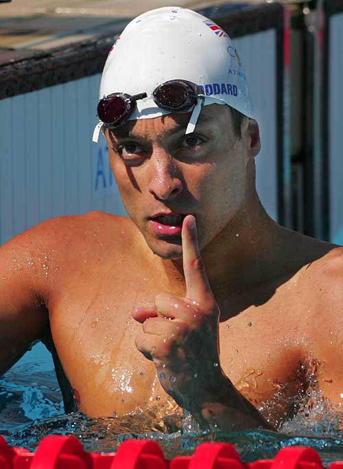 Britain's James Goddard reacts a the finish of the men's 200 metres backstroke after swimming his heat at the Athens 2004 Olympic Games August 18. Goddard had the second fastest qualifying time.  Reuters photo