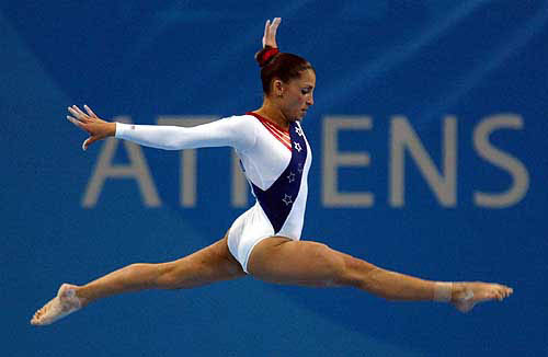 Mohini Bhardwaj of the United States competes in the balance beam during the women's gymnastics team final at the 2004 Summer Olympic Games in Athens, Tuesday, August 17.  AP/PTI photo