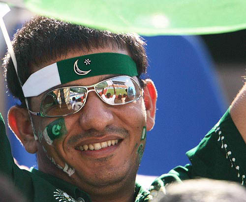 A Pakistan supporter watches the men's preliminary field hockey match between Pakistan and South Korea at the Athens 2004 Olympic Games on August 19.  Reuters