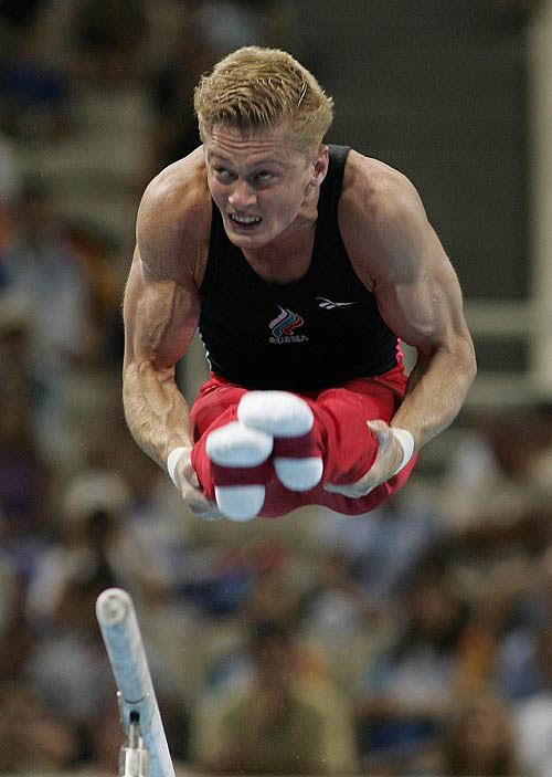 Russia's Alexei Bondarenko performs a routine on the parallel bars during the men's artistic gymnastics individual all-round final at the Athens 2004 Olympic Games on August 18.