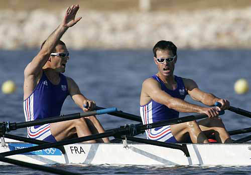 France's rowers Frederic Dufour (left) and Pascal Touron celebrate after their first place finish in the men's lightweight double sculls semi-finals at the Athens 2004 Olympic Games on August 19.