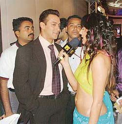 Bollywood star Salman Khan with VJ Anusha at the "One Walk For Life" charity event held in Mumbai