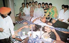 Volunteers donate blood at a camp at Dr Ambedkar Bhavan