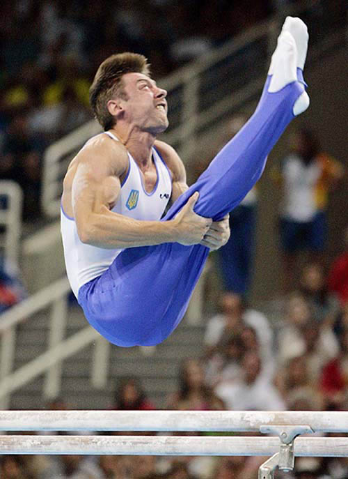 Ukraine's Valeri Goncharov competes on the parallel bars during the men's gymnastics individual apparatus finals at the 2004 Summer Olympic Games in Athens on August 23. Goncharov won the gold medal.  AP/PTI 