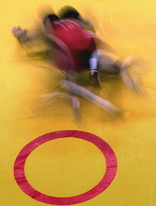 India's Khatri Mukesh (red) wrestles Poland's Jablonski Dariusz during men's Greco-Roman 55kg elimination round in Athens 2004 Olympic Games on August 24.