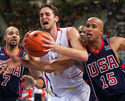Spain's Pau Gasol (centre) battles for the ball with Richard Jefferson (right) of the US as Carlos Boozer (left) of the US watches during their men's basketball quarter-final at the Athens 2004 Olympic Games on August 26.