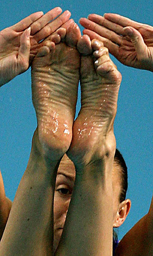 Britain's Jane Smith dives during semi-finals of the women's three meter springboard at the 2004 Olympic Games in Athens on August 26.