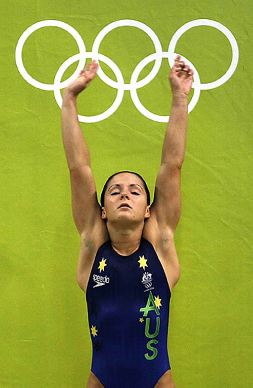 Australia's Loudy Tourky prepares for her dive during semi-finals of the women's three meter springboard at the 2004 Olympic Games in Athens on August 26. Tourky qualified for the finals.