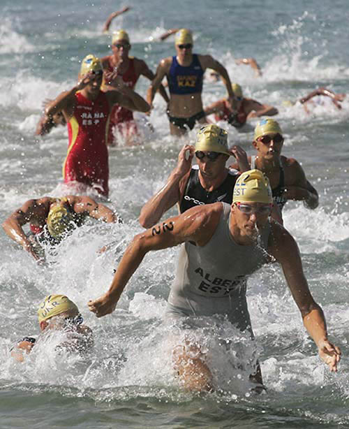 Estonia's Marko Albert heads out of the water during the swim section of the men's triathlon event at the Athens 2004 Olympic Games on August 26. New Zealand's Hamish Carter won gold.