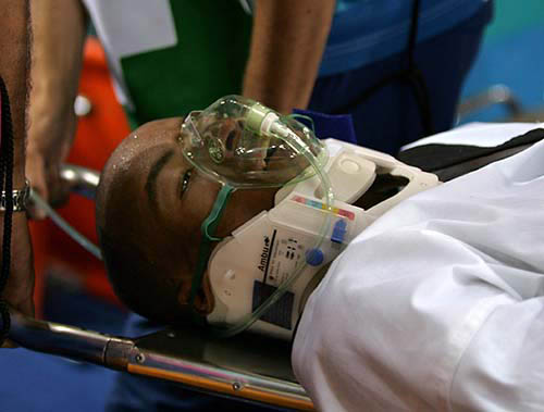 Central African Republic's Bertrand Gbongou Liango receives medical attention in the men's under 68 kg quarter-final taekwondo competition against Austria's Tuncay Caliskan at the Athens 2004 Olympic Games on August 27.