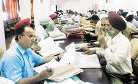 MC and government employees fill requisition forms for issuing birth certificates in Ludhiana