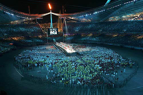 A general view of the Olympic Stadium as President of the International Olympic Committee Jacques Rogge speaks during the closing ceremony of the Athens 2004 Olympic Games, August 29, 2004. The next summer Olympic Games will be held in Beijing in 2008. REUTERS/Kin Cheung