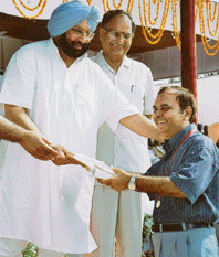 Chandigarh-based author Prem Vij receives the Punjab State Award in literature from the Punjab Chief Minister, Capt Amarinder Singh. The award was presented to him on Independence Day.