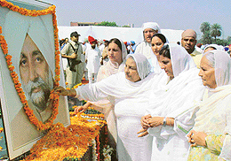 Mrs Jaswant Kaur and Ms Gurkanwal Kaur, wife and daughter of the late Chief Minister Beant Singh, pay floral tributes at his samadhi on his death anniversary in Sector 42, Chandigarh, on Tuesday.