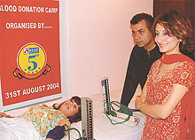 Famous singer Vandna Vedhra donating blood while Nitin Bali and Geetika Ganju awaiting their turn at a blood donation camp, organised by Rashi Entertainment in the Capital.