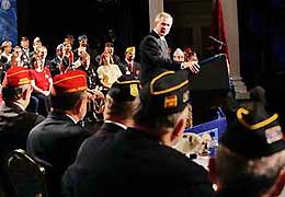 US President George W. Bush looks back while speaking at the American Legion National Convention in Nashville