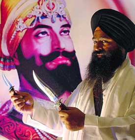 Swiss knife maker Victorinox launches a series of kirpans in New Delhi on Wednesday to mark the 400th anniversary of the installation of Guru Granth Sahib