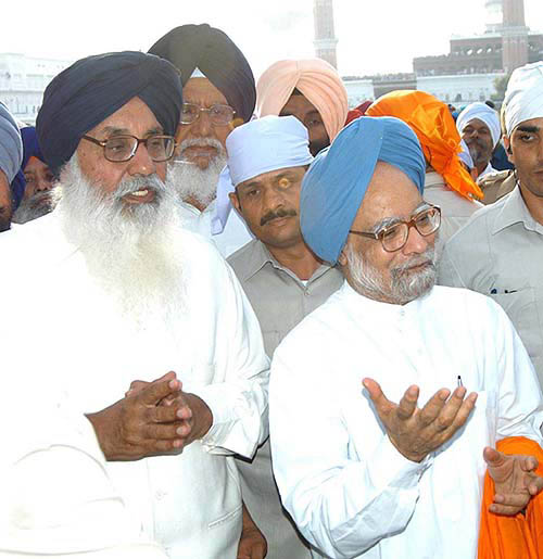 Prime Minister Manmohan Singh with former Chief Minister and SAD chief Parkash Singh Badal
