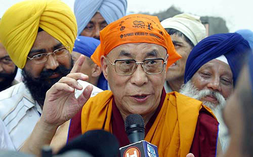 The Dalai Lama interacts with the media at the Golden Temple